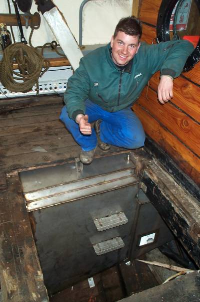 Rasmus (Jegvan's little brother) is fortunately a very skilled blacksmith and ship fitter so he has made a new water tank and a sewage tank for Saga. as you can see a hole needs to be made in the ship to get them in place. Jegvan does the carpentry work and mounts the down hatch and new deck over the hole.